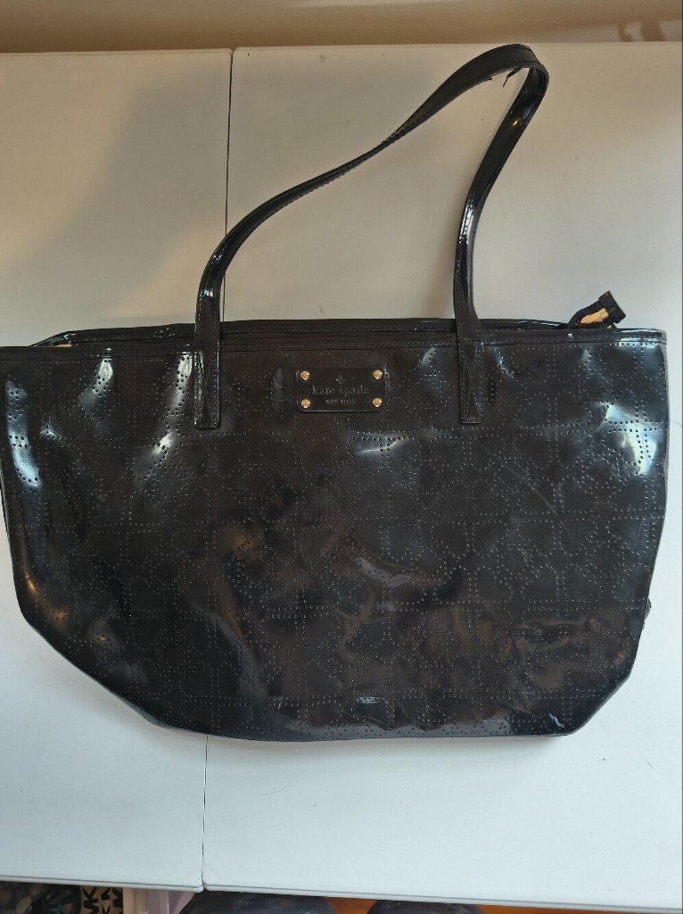 kate spade black patent tote with subtle embossed pattern